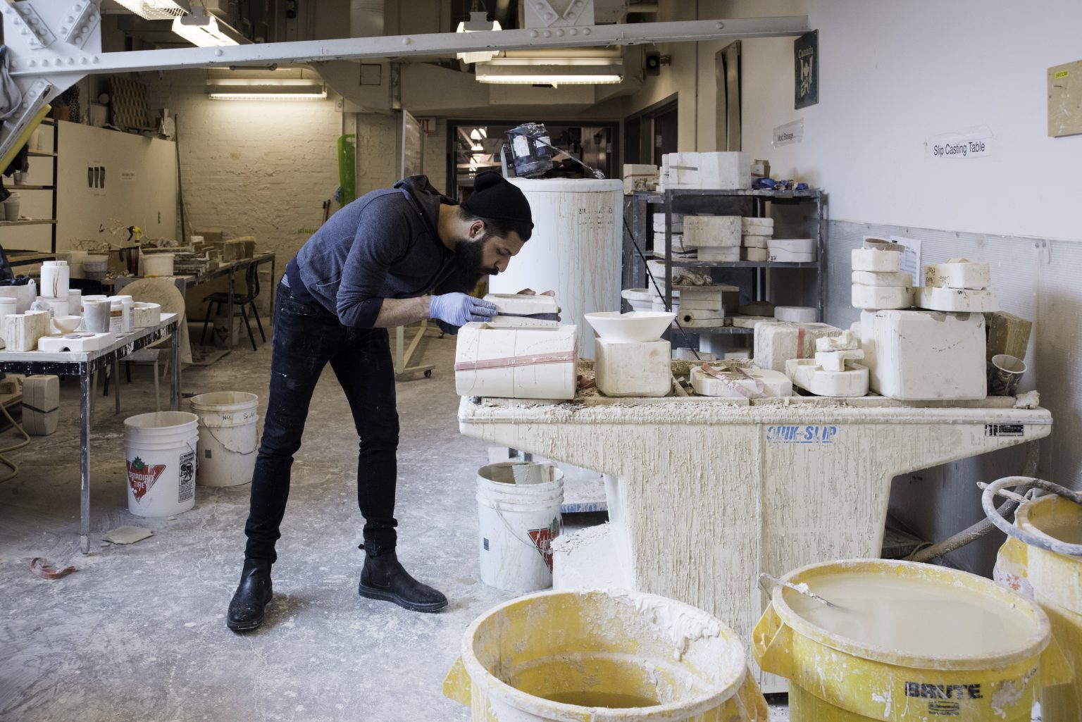 Ceramics student at work in studio